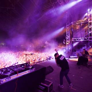 DJ Energizes Crowd at Coachella Concert