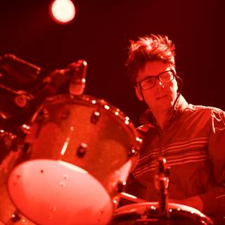 Drumming with Eyeglasses on Stage