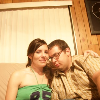 Couple Relaxing Together on Couch at Home