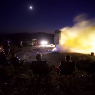 Night-time Rocket Launch Spectators