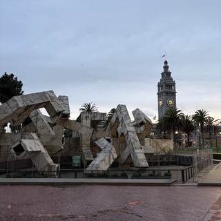 Deconstructed Architecture Against Ferry Building Clock Tower at Dusk