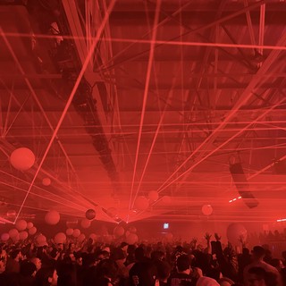 Intense Red Laser Light Show at Electronic Music Concert
