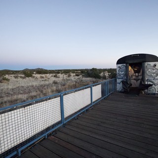 Desert Observatory Structure at Twilight with Indigenous Art
