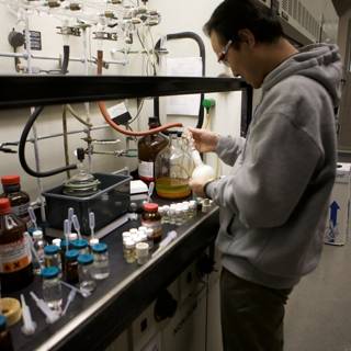 Lab Technician Working on Bottle
