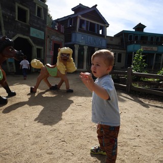 Toddler's Wonder at Western-Themed Fantasyland Attraction