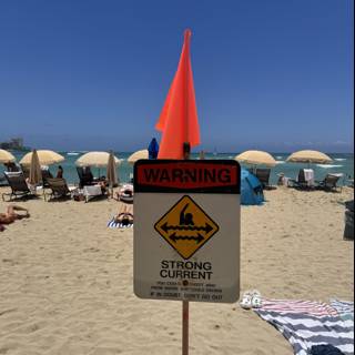 Heed the Warning: A Sunny, Yet Cautious Day at Waikiki Beach