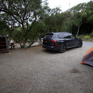BMW X7 Parked at Coastal California Campsite