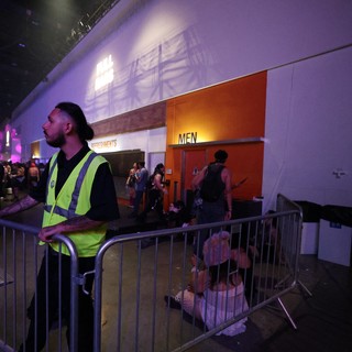 Security Guard Monitors Crowd at Wobbleland Festival
