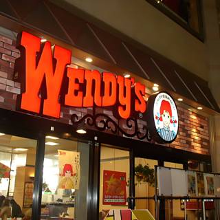 Wendy's restaurant sign in urban setting