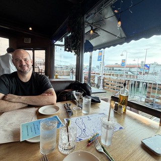 Rooftop Restaurant Dining with Urban Skyline Views
