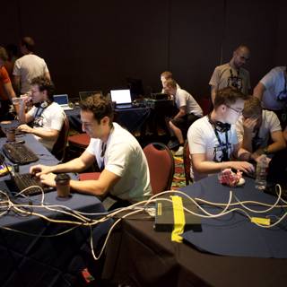 Defcon 18: Seven Men with Laptops at the Table