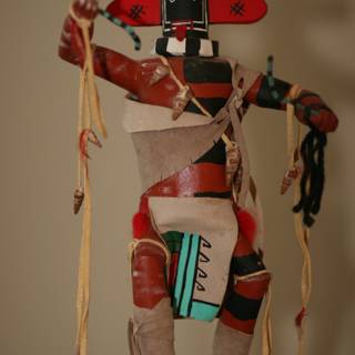 Wooden Pole with Native American Doll