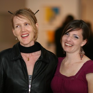 Two Women Laughing at March Art Walk 2006