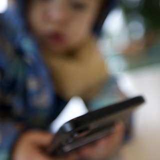 Mobile Phone Moment at Dinner Table