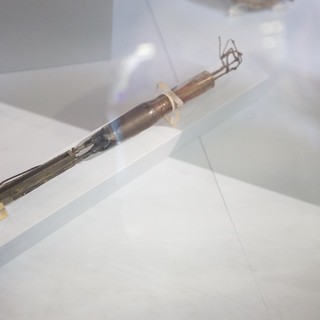 Ancient Bamboo and Metal Tool in Museum Display
