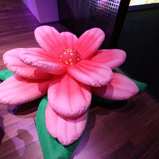 Oversized Pink Plush Flower Installation at Indoor Event