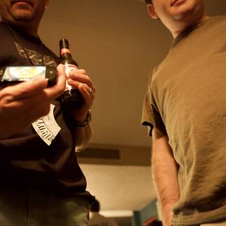Two Men Enjoying Some Beers