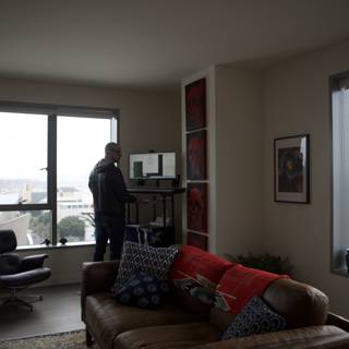 Man Contemplating in a Modern Living Room