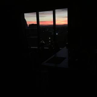 Silhouette of Sunset Through the Window
