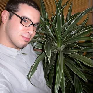 Portrait of Man with Potted Plant