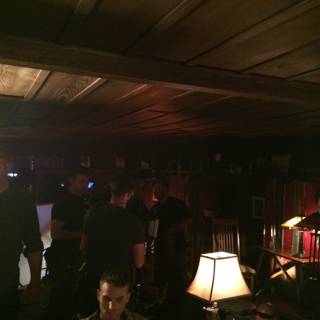 Gathering of Men in a Lighted Pub