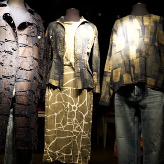 Contemporary Fashion Exhibition Display with Textured Garments