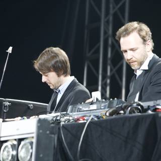 Electronic Music Duo Rocks the Crowd in Suits