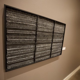Framed Metallic Textile Art with Geometric Pattern Display