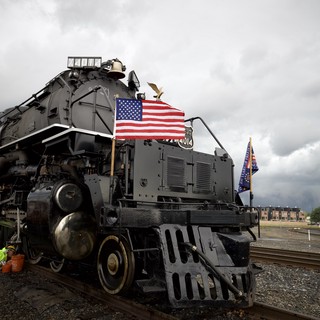 Historic Steam Locomotive with American Flag Display