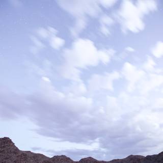 Majestic Mountain Range Under a Dramatic Sky