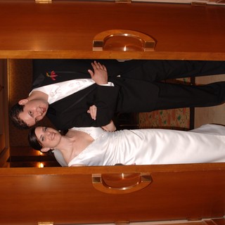 Bride and Groom Framed in Grand Ballroom Doorway