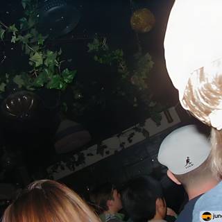 Nightclub Fun with a White Hat