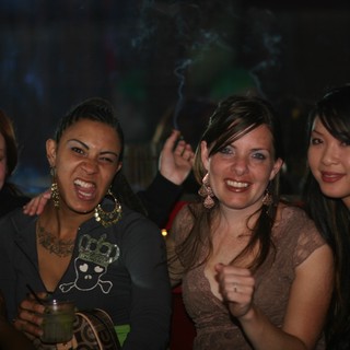 Friends Celebrating at a Nightclub in 2006
