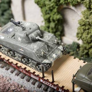 Armored Toy Tank on Train Tracks