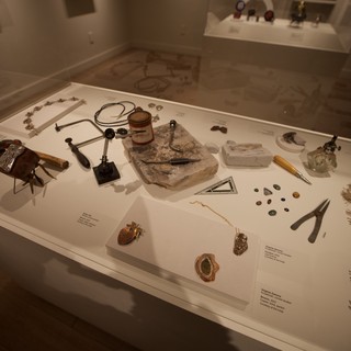 Museum Display Case of Personal Artifacts and Jewelry