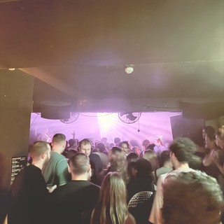 Underground Club Night with Purple Stage Lighting