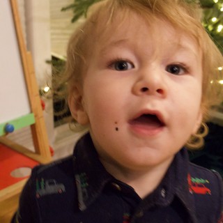 Curious Toddler on Christmas Morning
