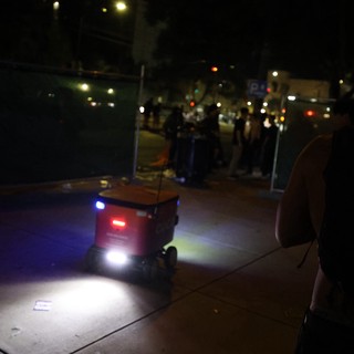 Autonomous Delivery Robot Navigates Nighttime Festival Crowd