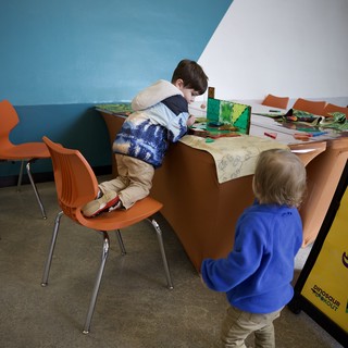 Children Creating Art at Educational Activity Table