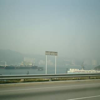 Ship and Highway View from a Car
