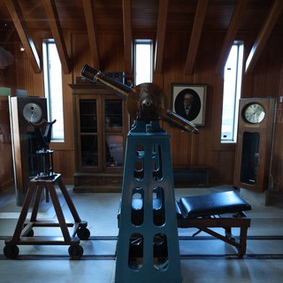 Historic Observatory Interior with Vintage Telescopes