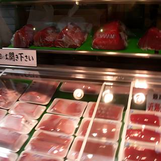 Butcher Shop Display in Osaka's Technology District