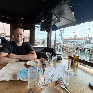 Casual Dining Moment at Urban Waterfront Restaurant