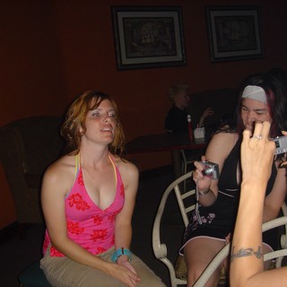 Friends Captured in Warm Bar Ambiance 2004