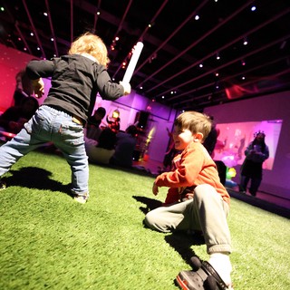 Children Playing at Baby Rave Light Installation