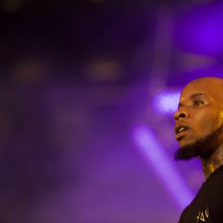 Tory Lanez Takes Over the Stage with Inked Chest