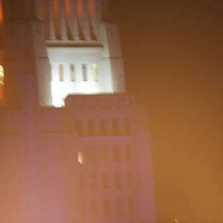 The Glowing City Hall in the Fog