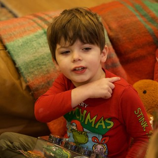 Young Boy in Grinch Pajamas on Christmas