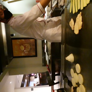 Teppanyaki Chef Cooking at Japanese Grill