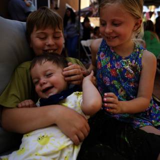 The Joy of Sibling Love at Wesley's First Birthday Party